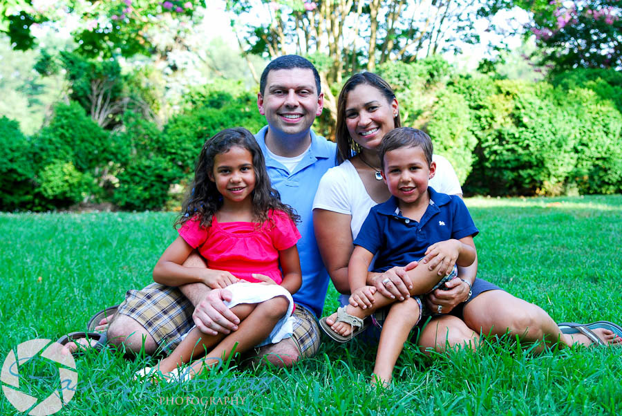 Family photo in the grass featuring the Longers