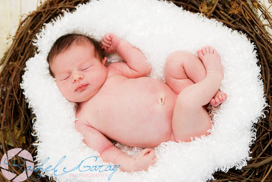 Newborn sleeping in a special nest