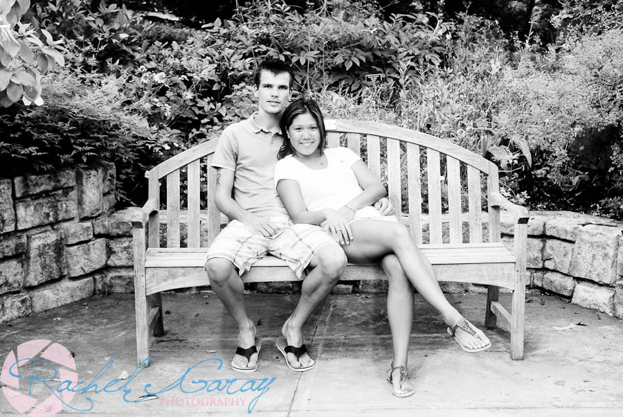 Young couple on park bench in this photography session